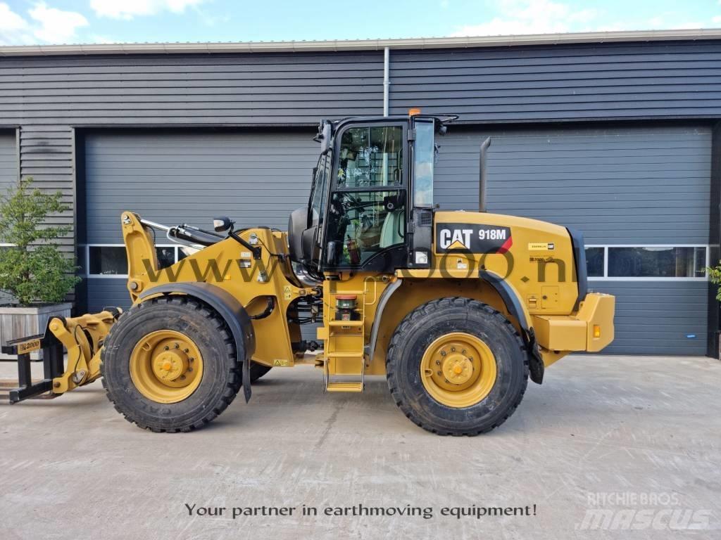 CAT 918 M Naudoti ratiniai krautuvai