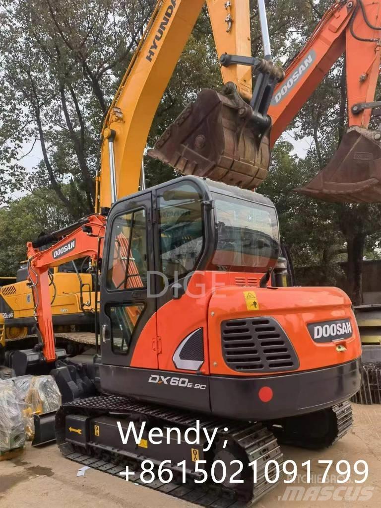 Doosan DX 60 Vidutinės galios ekskavatoriai 7-12 t