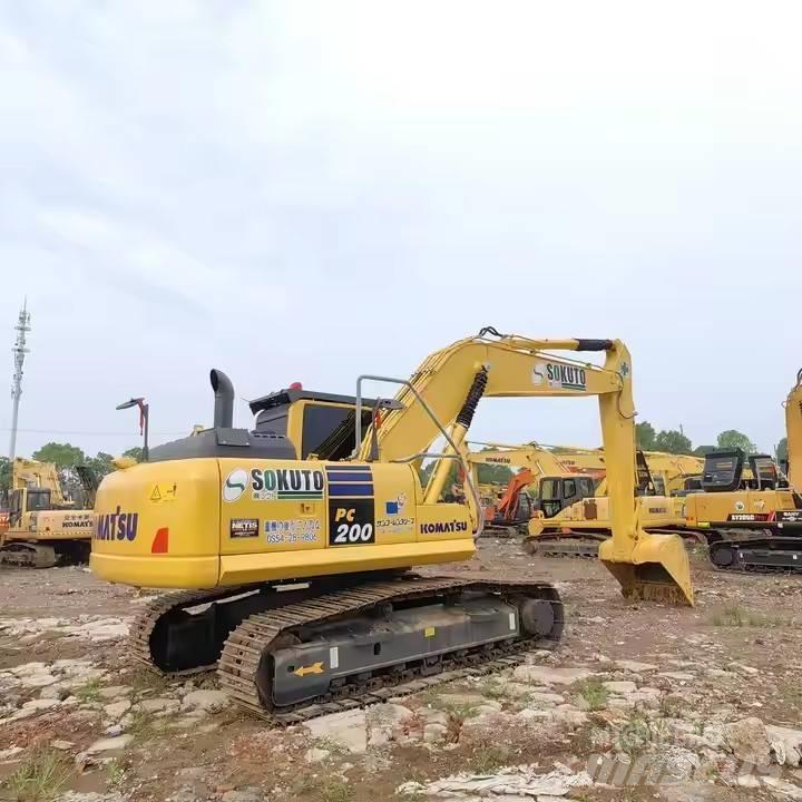 Komatsu PC200 Vidutinės galios ekskavatoriai 7-12 t