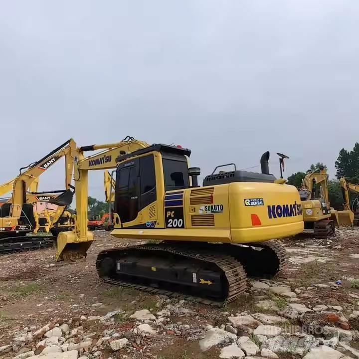 Komatsu PC200 Vidutinės galios ekskavatoriai 7-12 t