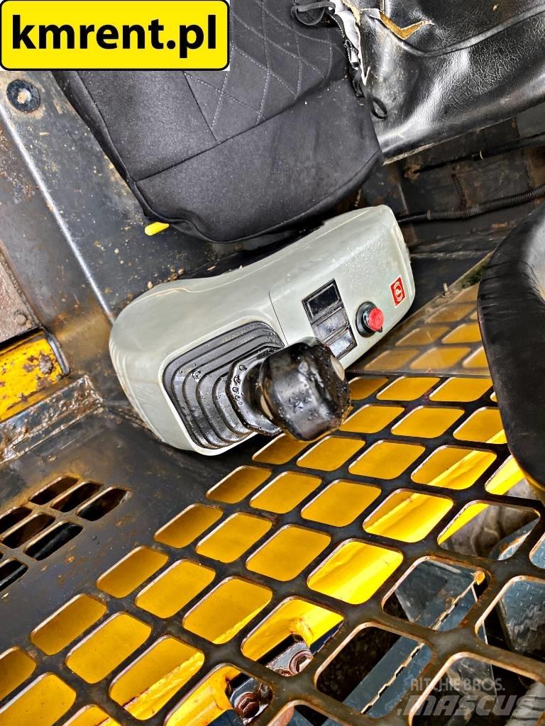 Komatsu SK 815 Krautuvai su šoniniu pasukimu