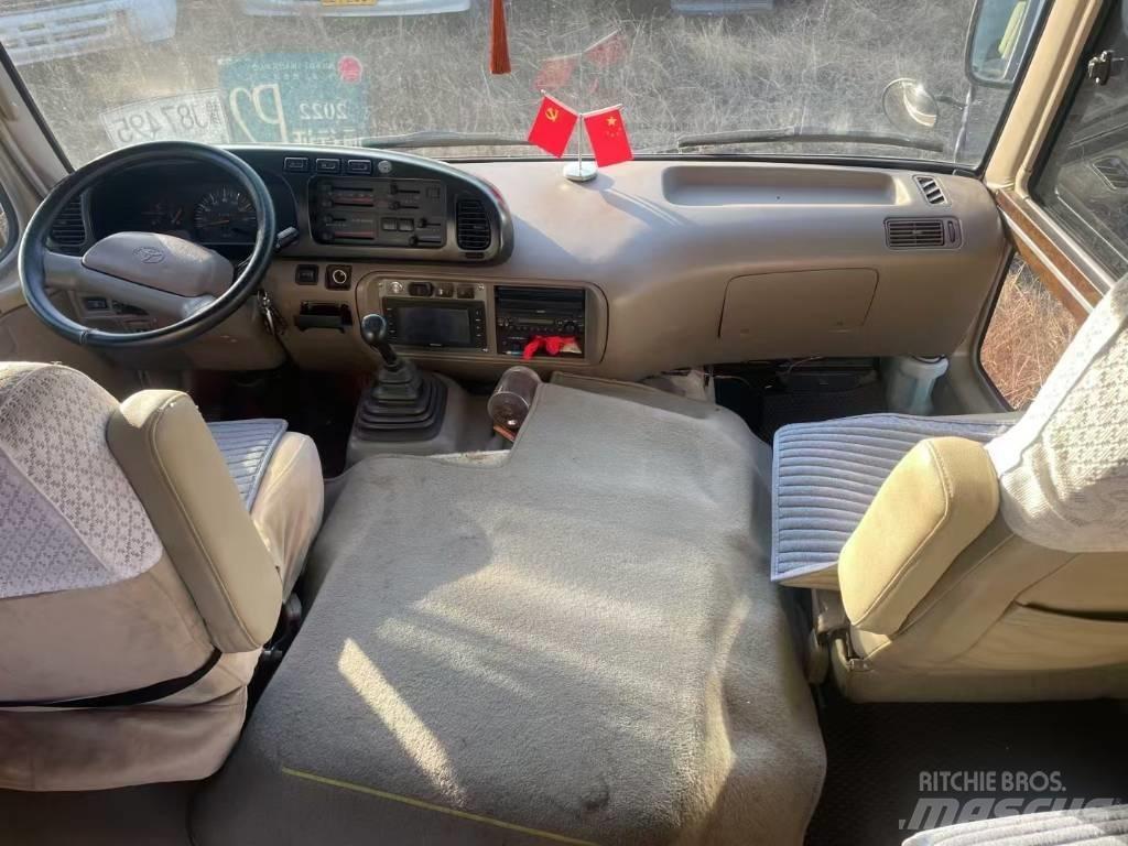 Toyota Coaster Tarpmiestiniai autobusai