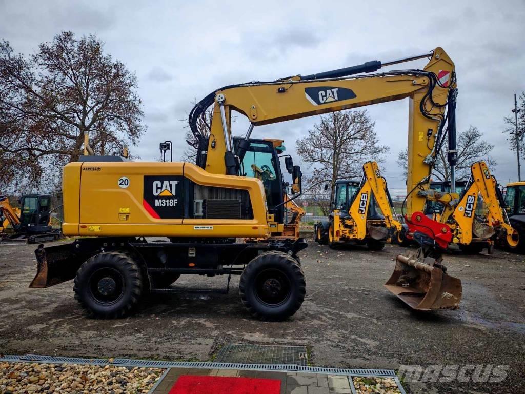 CAT M 318 F Ratiniai ekskavatoriai