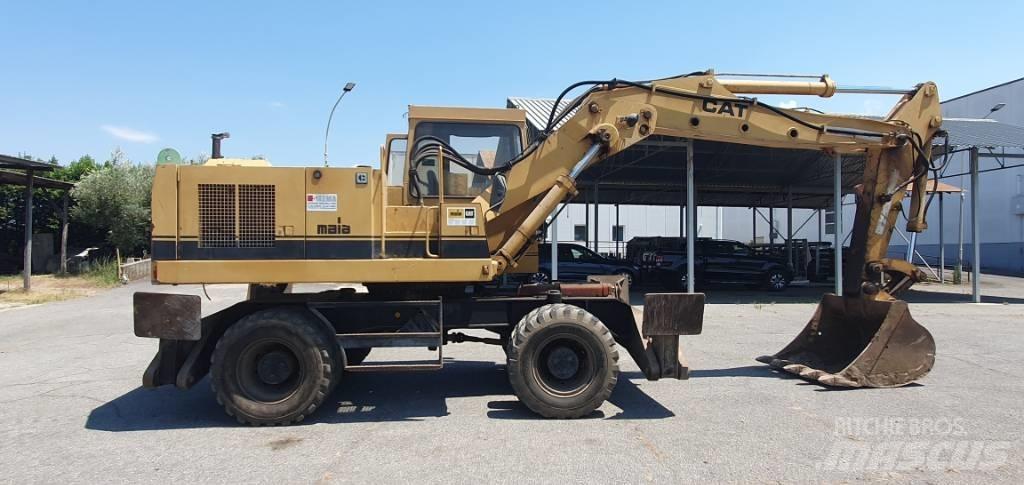 CAT 214 B Ratiniai ekskavatoriai