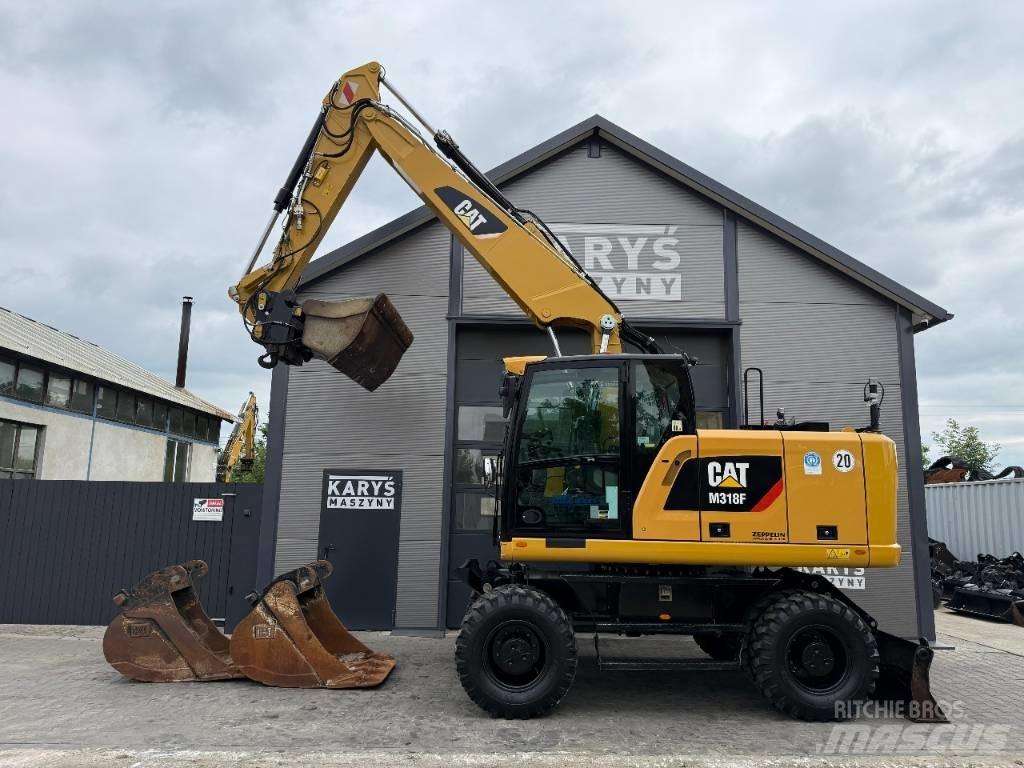 CAT M 318 F Ratiniai ekskavatoriai