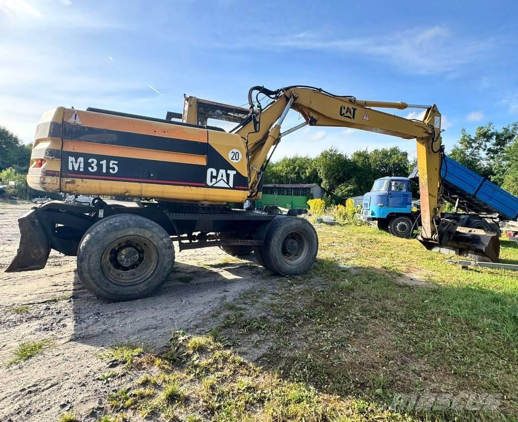 CAT M 315 Ratiniai ekskavatoriai