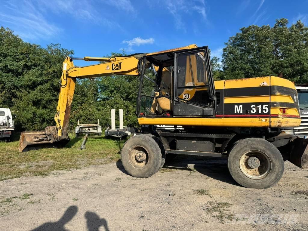 CAT M 315 Ratiniai ekskavatoriai