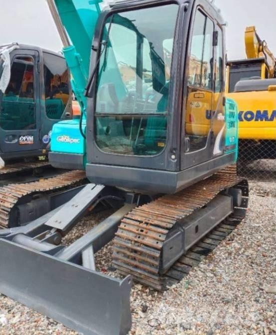 Kobelco SK 75 Vidutinės galios ekskavatoriai 7-12 t