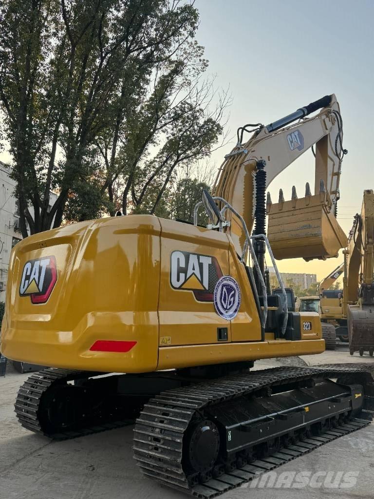 CAT CAT323 Vidutinės galios ekskavatoriai 7-12 t