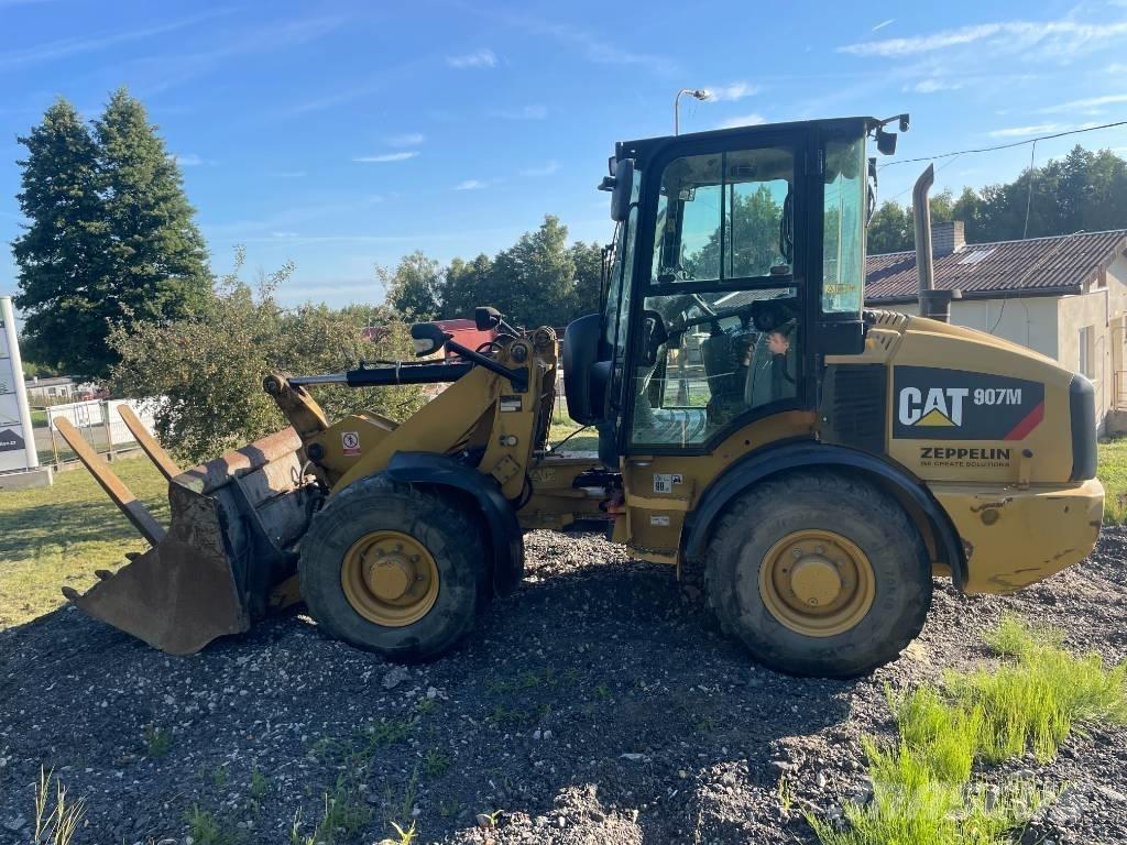 CAT 907 M Naudoti ratiniai krautuvai