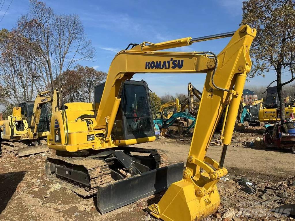 Komatsu PC 70 Vidutinės galios ekskavatoriai 7-12 t
