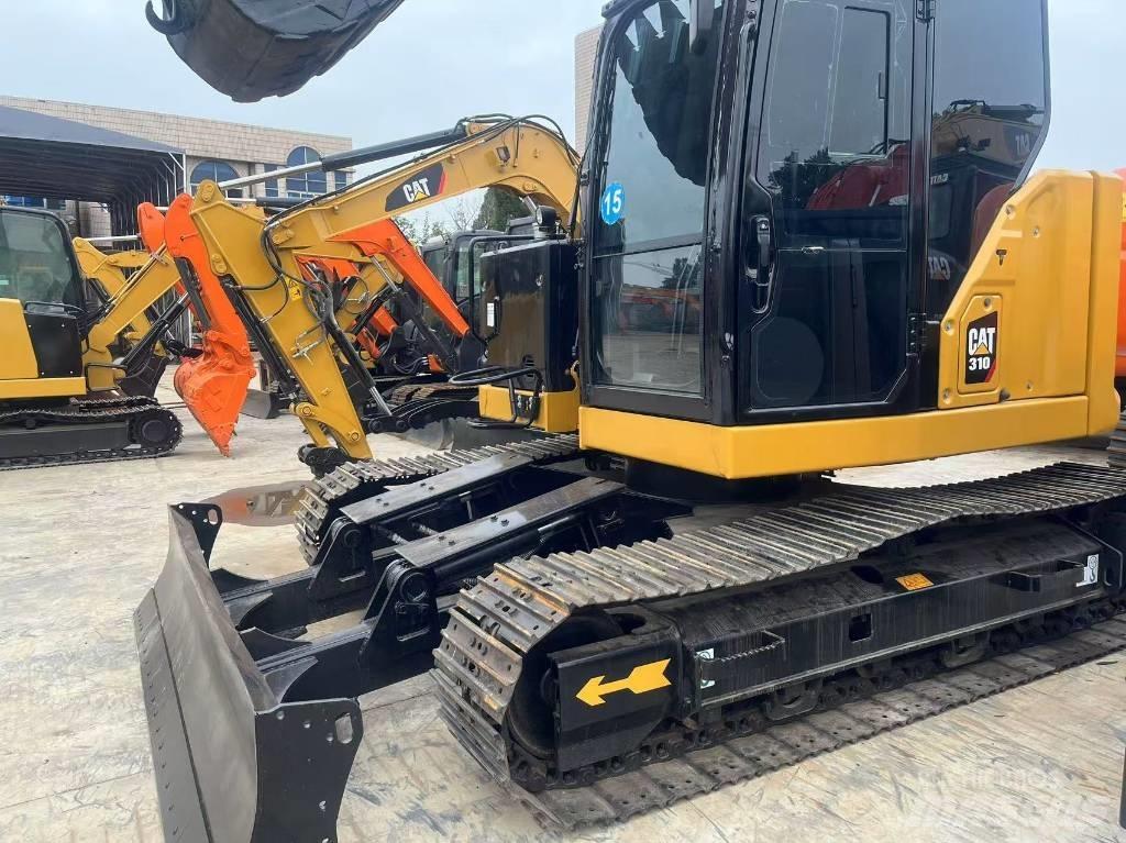 CAT 310 Vikšriniai ekskavatoriai