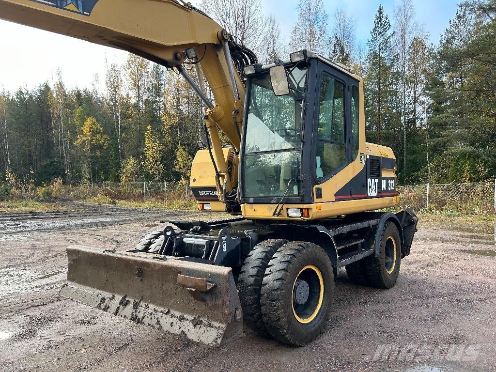 CAT M312 Naudoti ratiniai krautuvai