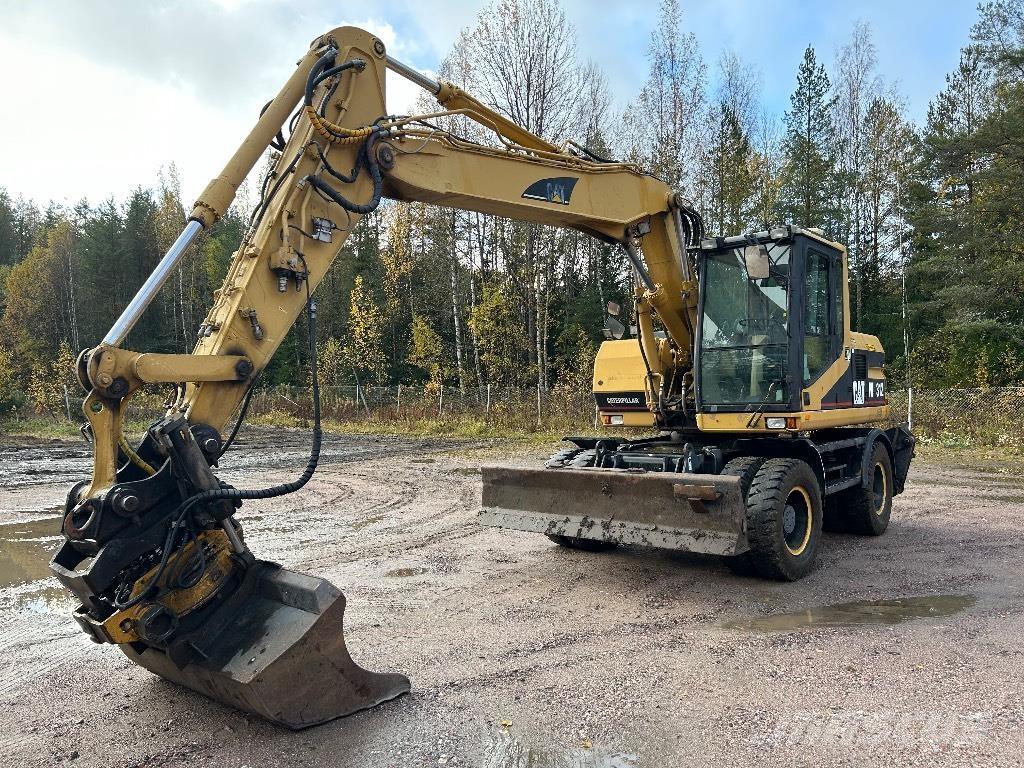 CAT M312 Naudoti ratiniai krautuvai