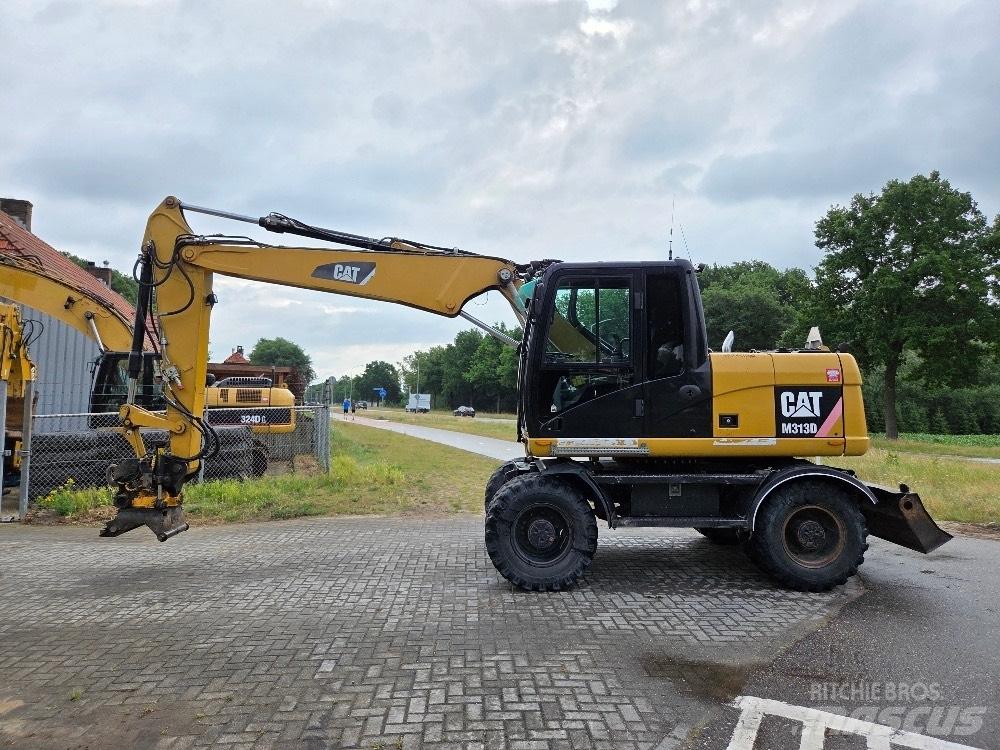 CAT M313D Ratiniai ekskavatoriai