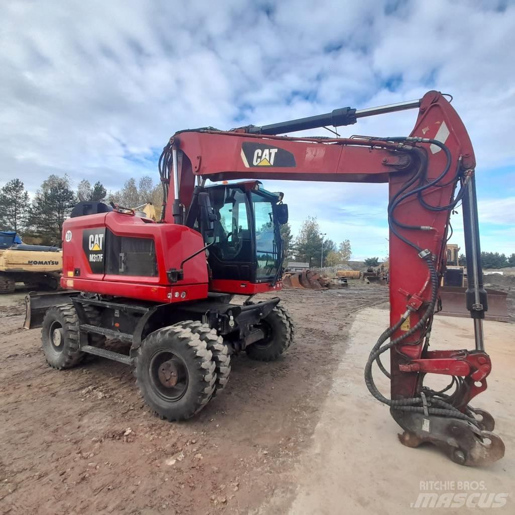 CAT M317 Ratiniai ekskavatoriai
