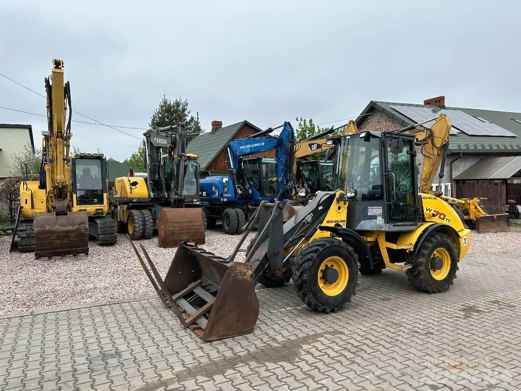 New Holland W 70 TC Naudoti ratiniai krautuvai
