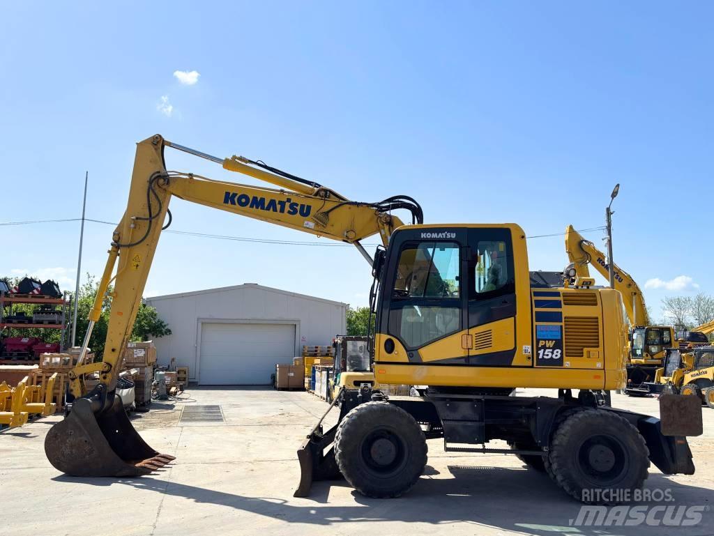 Komatsu PW 158-11 Ratiniai ekskavatoriai