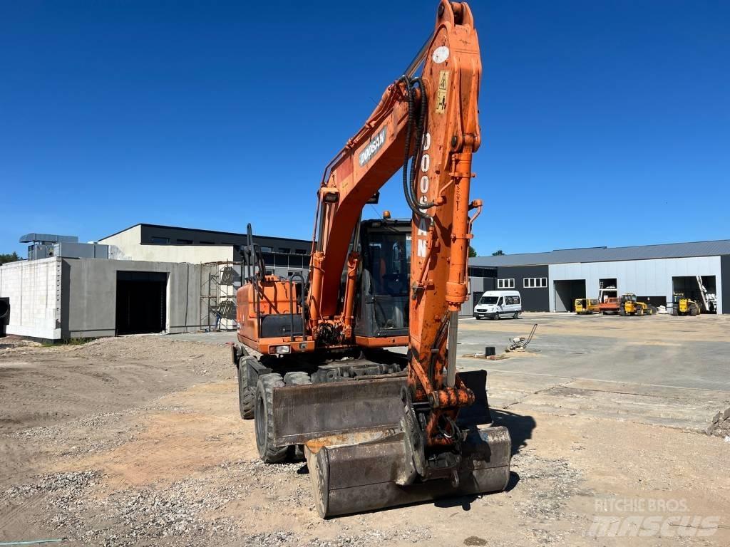 Doosan DX 140 W Ratiniai ekskavatoriai