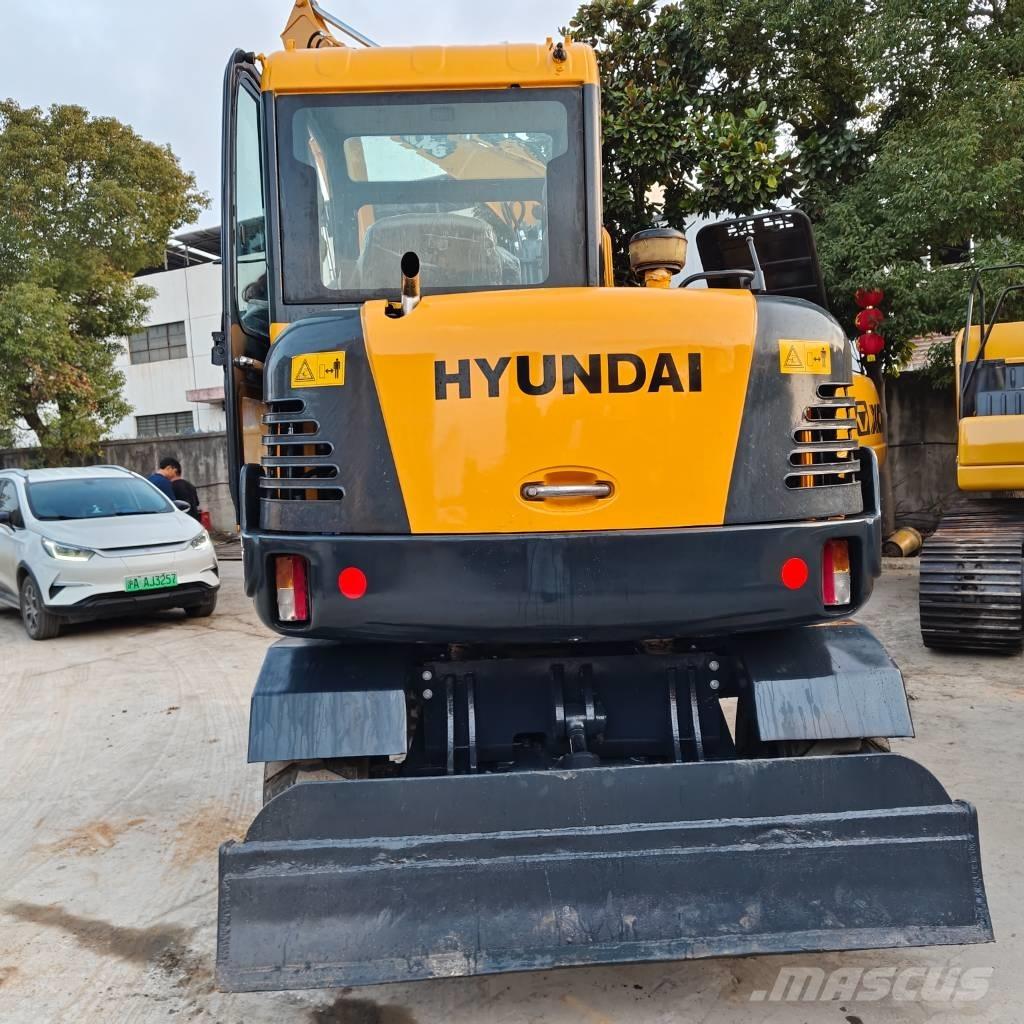 Hyundai 60 W VS Ratiniai ekskavatoriai