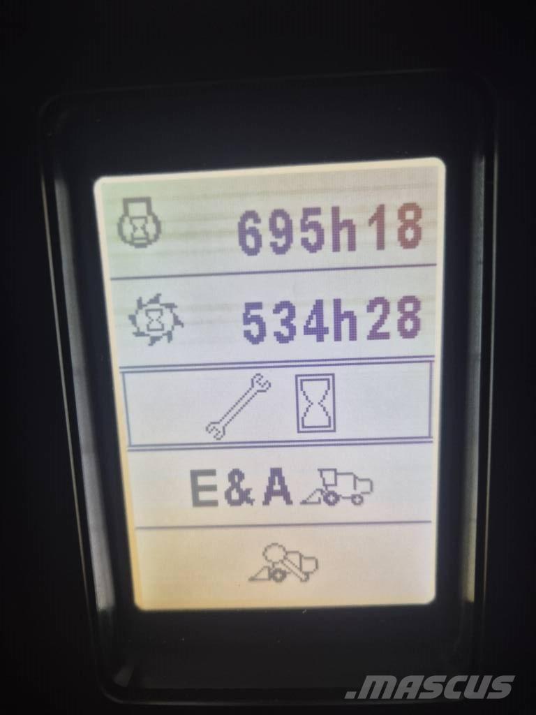 New Holland TC 5.90 Derliaus nuėmimo kombainai