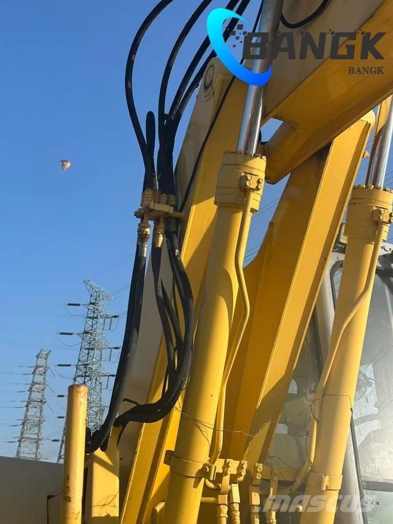  KOMΛ1'SU PW128us Ratiniai ekskavatoriai