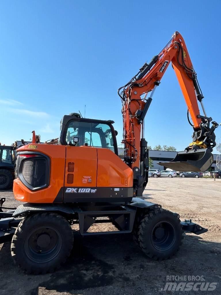 Develon DX 100 W-7 Ratiniai ekskavatoriai