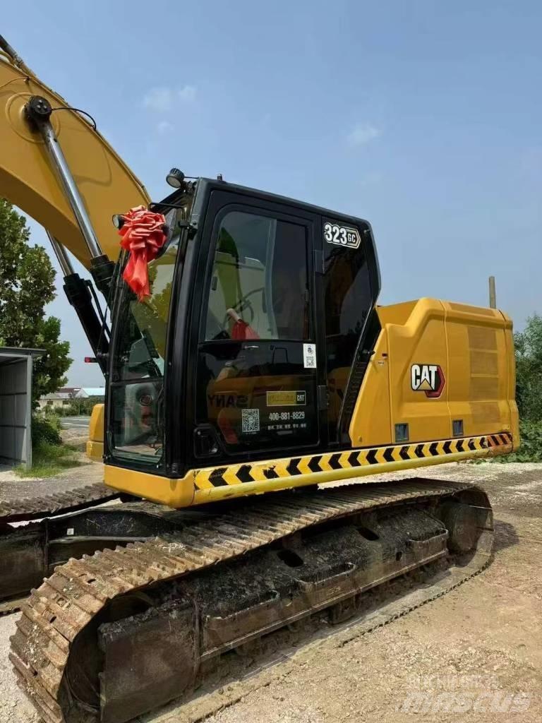 CAT 323GC Vikšriniai ekskavatoriai