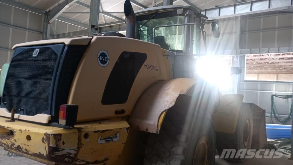 New Holland W 270 B Naudoti ratiniai krautuvai