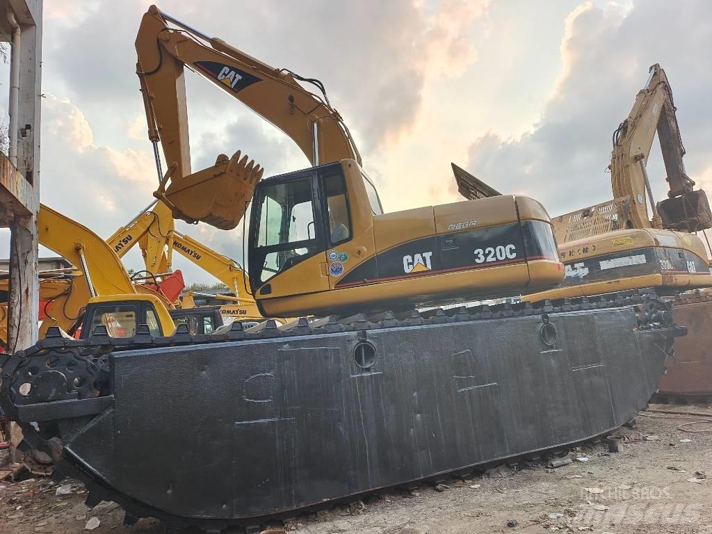 CAT 320 C Amfibiniai ekskavatoriai