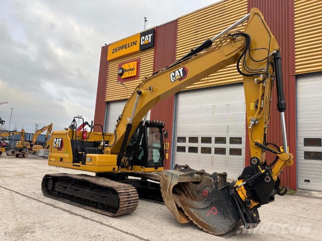 CAT 323 Vikšriniai ekskavatoriai