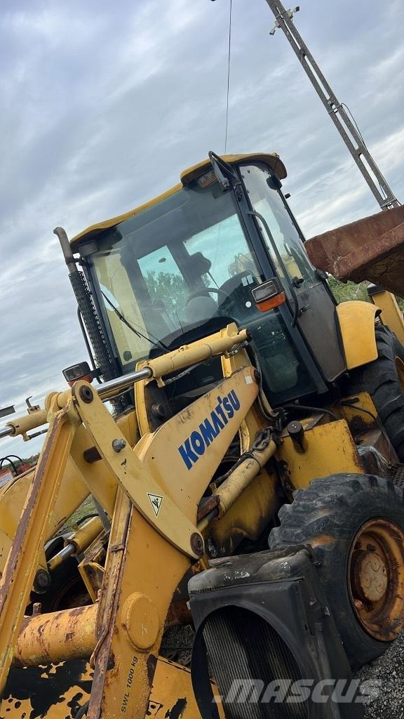 Komatsu WB 93 R Važiuoklė ir suspensija