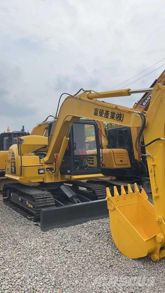 Komatsu PC 70 Vidutinės galios ekskavatoriai 7-12 t