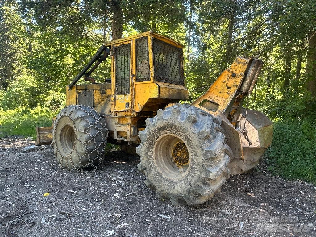John Deere 540 E Skiedrovežiai