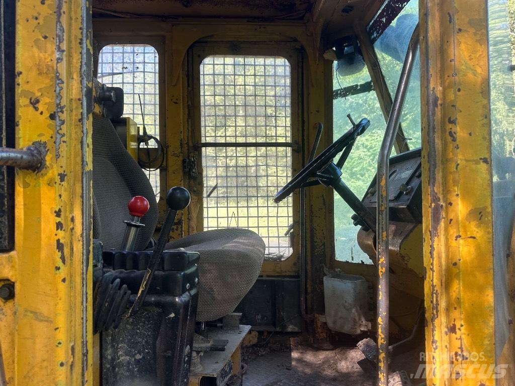 John Deere 540 E Skiedrovežiai