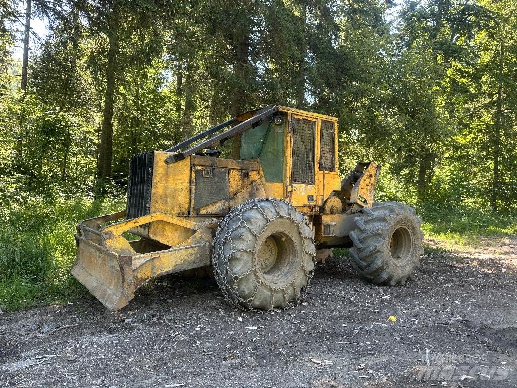 John Deere 540 E Skiedrovežiai