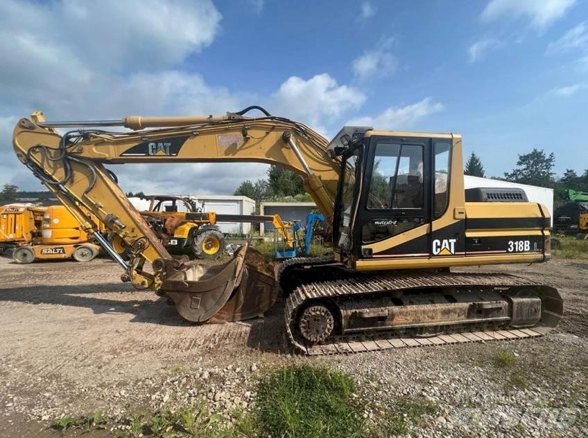 CAT 318 B Vikšriniai ekskavatoriai