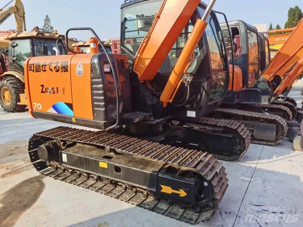 Hitachi ZX 70 Vidutinės galios ekskavatoriai 7-12 t