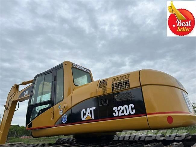 CAT 320 C Amfibiniai ekskavatoriai