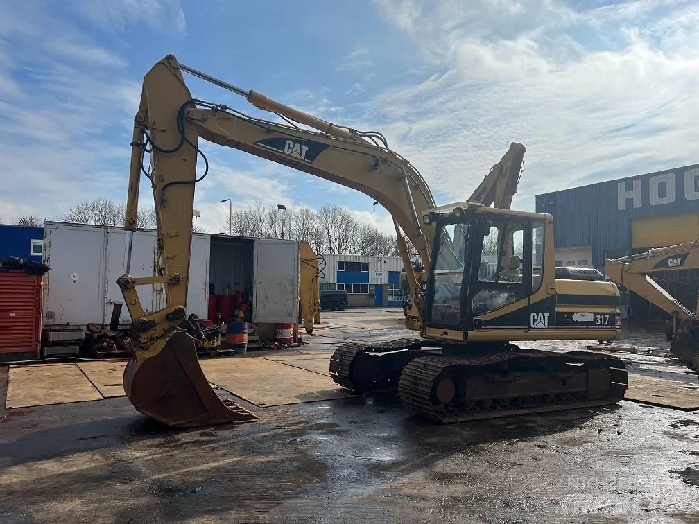 CAT 317 Vikšriniai ekskavatoriai