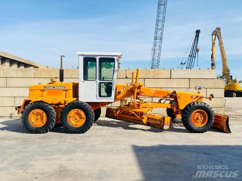 John Deere 570 A Greideriai