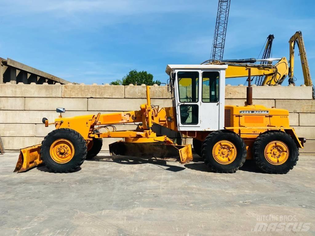 John Deere 570 A Greideriai