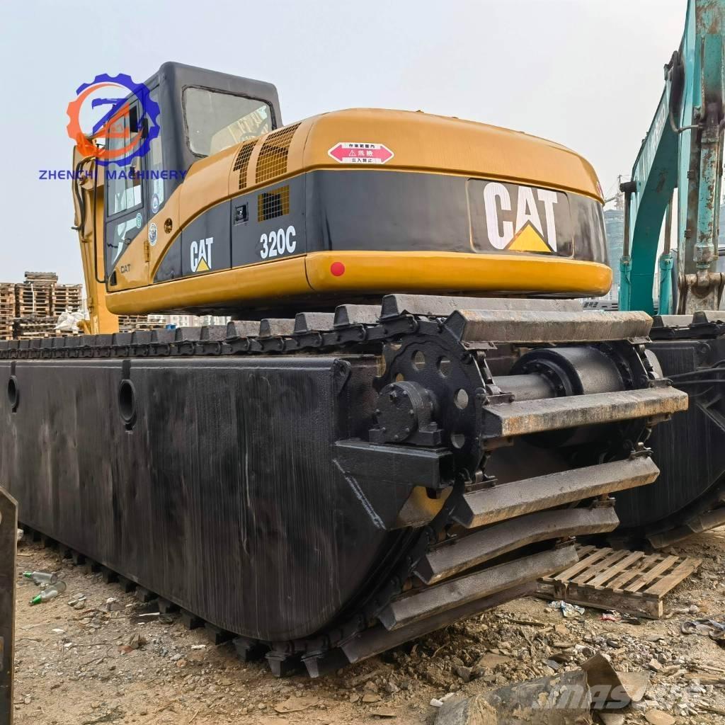 CAT 320 C Amfibiniai ekskavatoriai