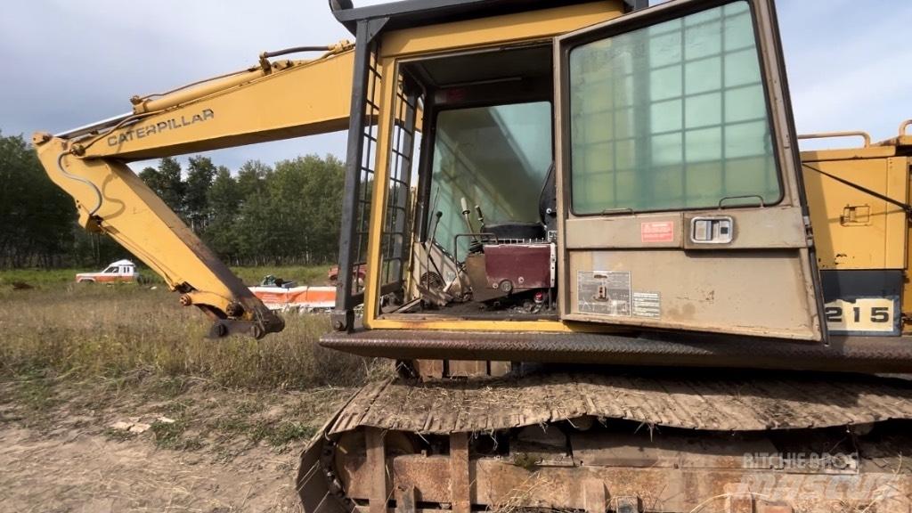 CAT 215 Vikšriniai ekskavatoriai