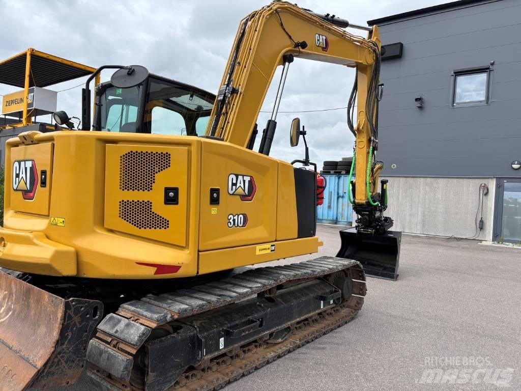 CAT 310 Vikšriniai ekskavatoriai
