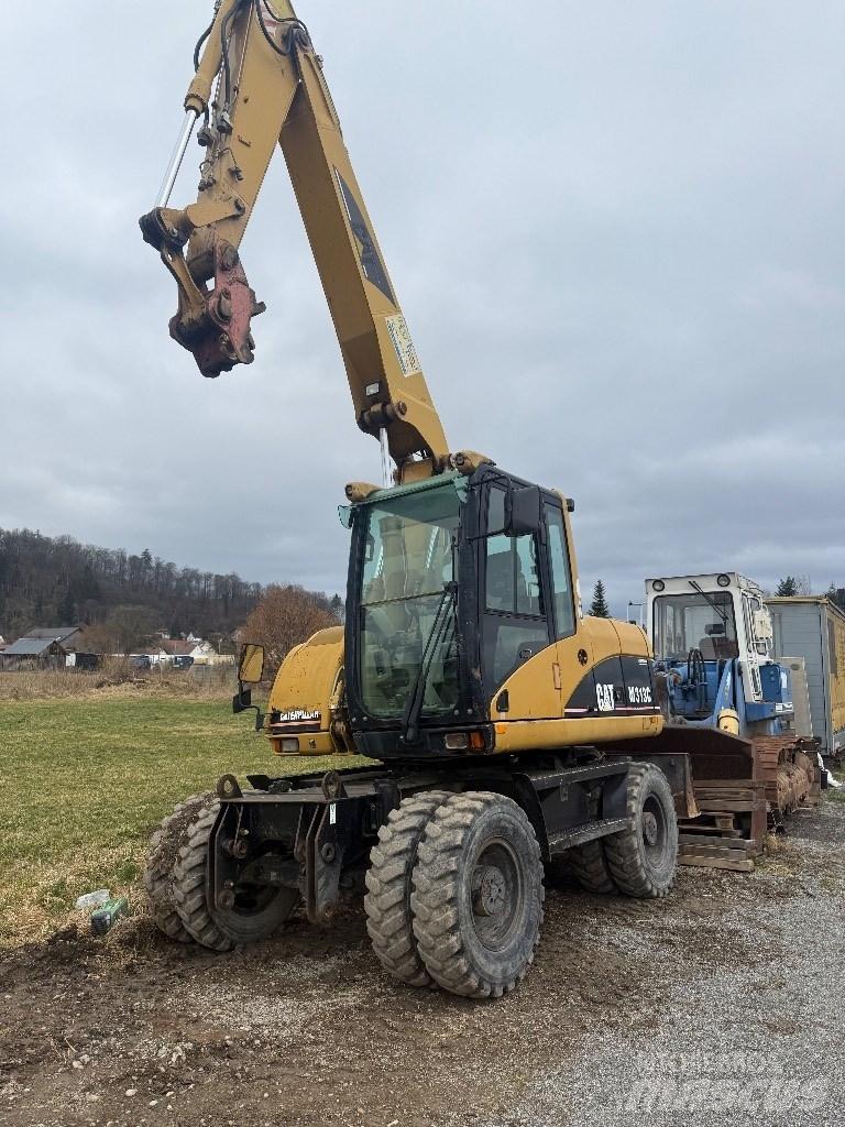 CAT M 313 C Ratiniai ekskavatoriai