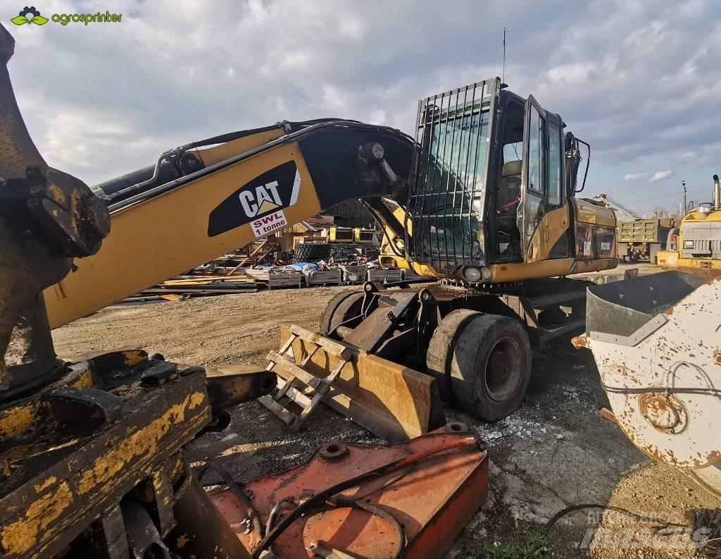 CAT M 318 D Atliekų / pramoniniai krautuvai