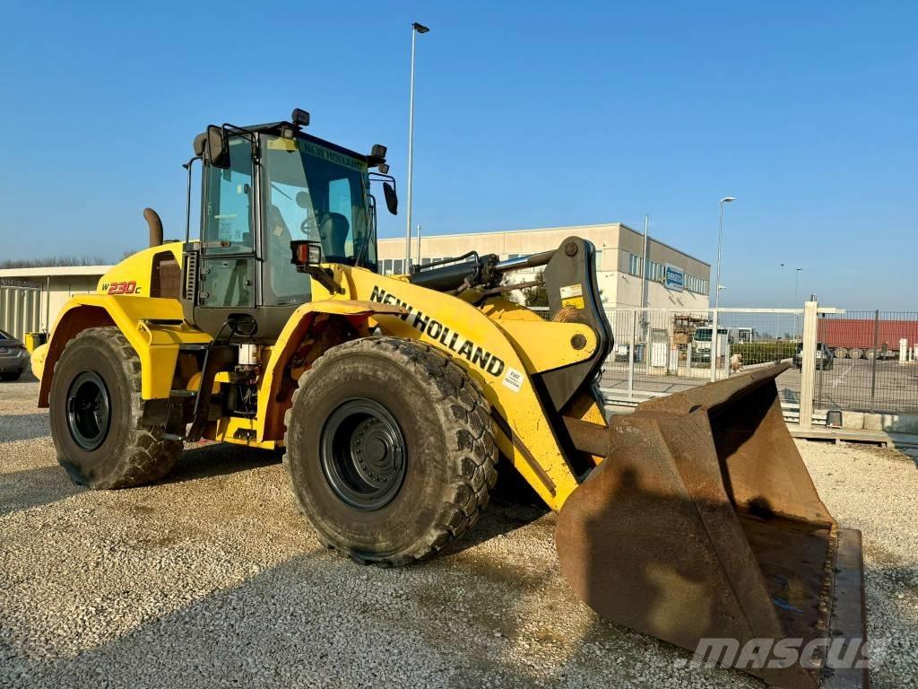 New Holland W 230 C Naudoti ratiniai krautuvai