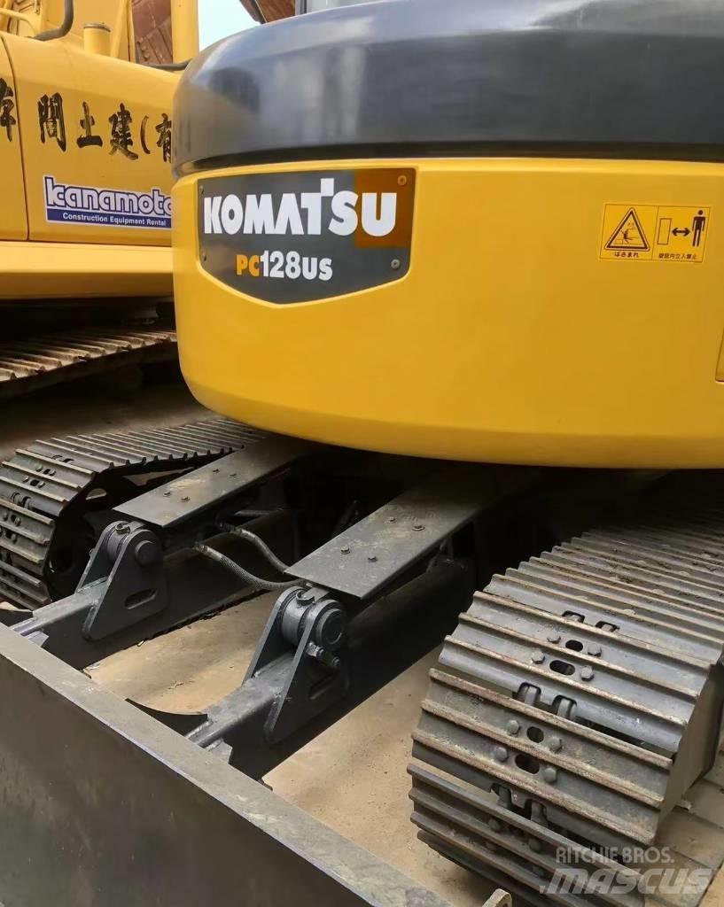 Komatsu 128 US Vikšriniai ekskavatoriai