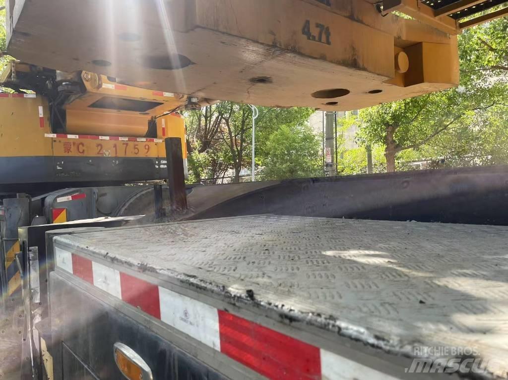 Sany STC 800 T5 Neapdoroto reljefo kranai